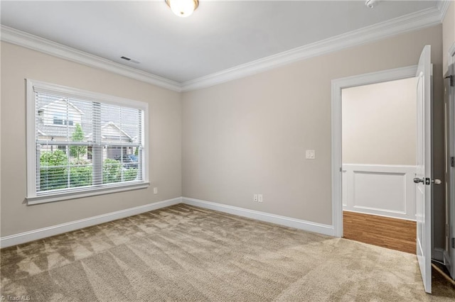 5707 Washburn Ln, Colfax, NC 27235 - carpeted empty room with ornamental molding and baseboards