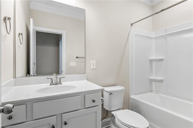 5707 Washburn Ln, Colfax, NC 27235 - full bathroom featuring crown molding, toilet, vanity, and bathtub / shower combination