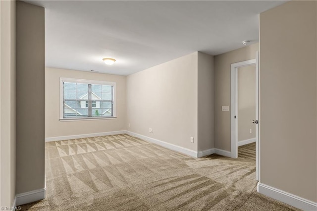5707 Washburn Ln, Colfax, NC 27235 - carpeted empty room featuring baseboards and a smoke detector