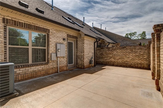 5707 Washburn Ln, Colfax, NC 27235 - view of patio featuring fence and cooling unit