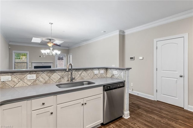 5707 Washburn Ln, Colfax, NC 27235 - kitchen with dishwasher, a sink, white cabinetry, dark wood-style floors, and a fireplace