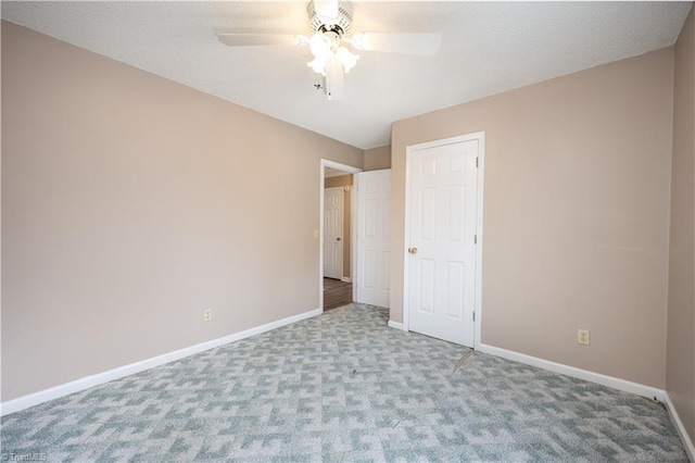 unfurnished bedroom with light carpet and ceiling fan