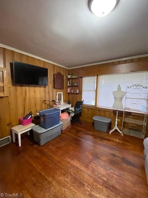 office with crown molding, dark hardwood / wood-style floors, and wood walls