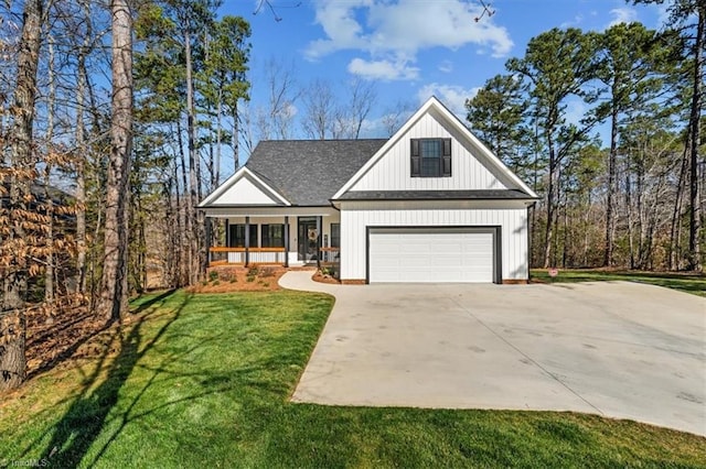 modern farmhouse featuring driveway, a shingled roof, a front lawn, a garage, and board and batten siding