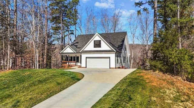 view of front of home with a front lawn, concrete driveway, roof with shingles, and stucco siding