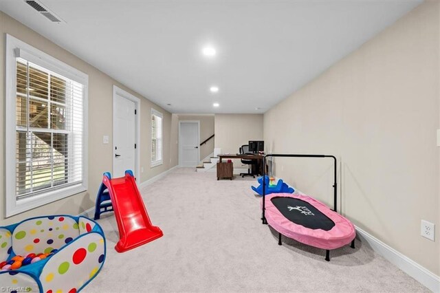 rec room with carpet flooring, recessed lighting, visible vents, and baseboards