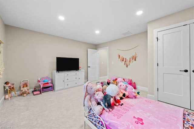 carpeted bedroom with recessed lighting, visible vents, and baseboards