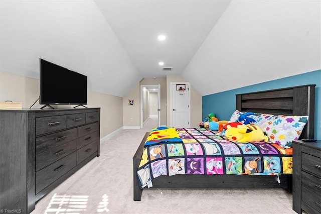 bedroom featuring visible vents, carpet floors, baseboards, and vaulted ceiling