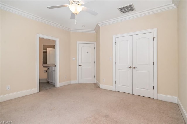 7469 Henson Forest Dr, Summerfield, NC 27358 - unfurnished bedroom with crown molding, carpet flooring, a closet, baseboards, and ensuite bathroom