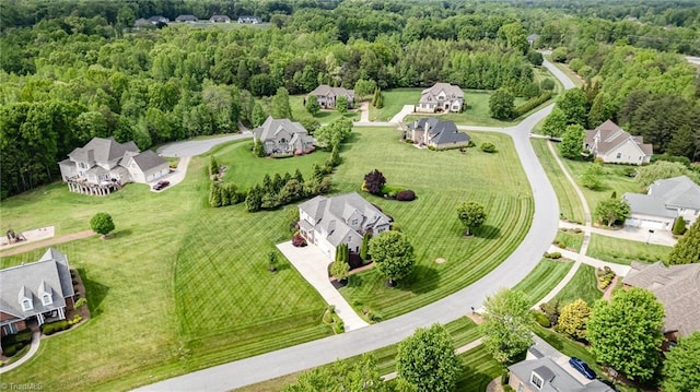 7469 Henson Forest Dr, Summerfield, NC 27358 - aerial perspective of suburban area with a forest