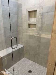 bathroom with walk in shower