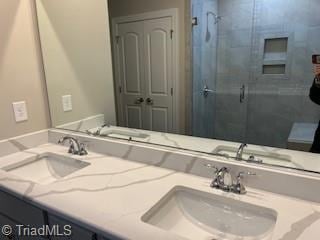 bathroom with double vanity