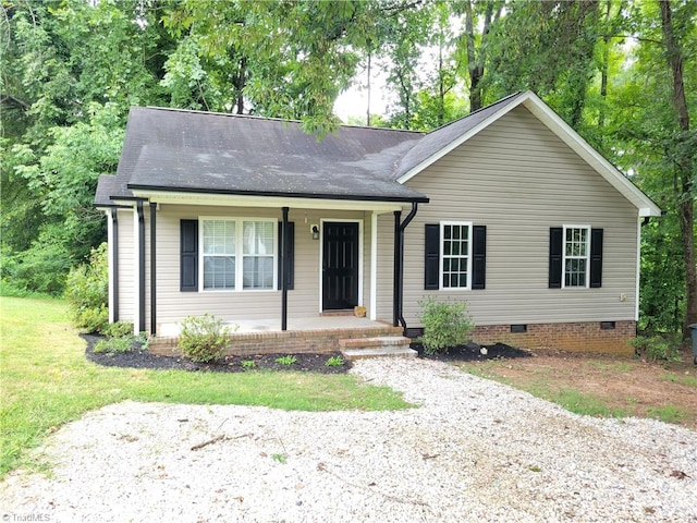 ranch-style home featuring covered porch