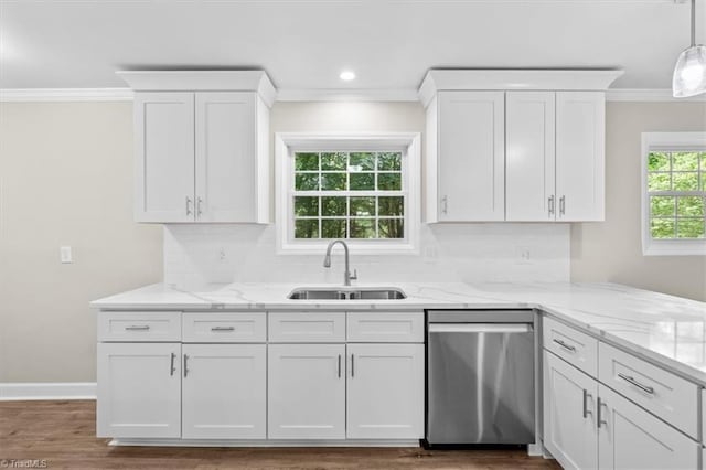 2517 Hopewell Friends Rd, Asheboro, NC 27205 - kitchen with stainless steel dishwasher, ornamental molding, white cabinetry, and tasteful backsplash