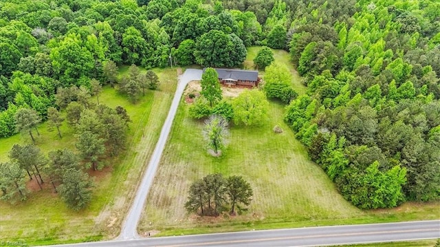 2517 Hopewell Friends Rd, Asheboro, NC 27205 - view of subject property with a heavily wooded area