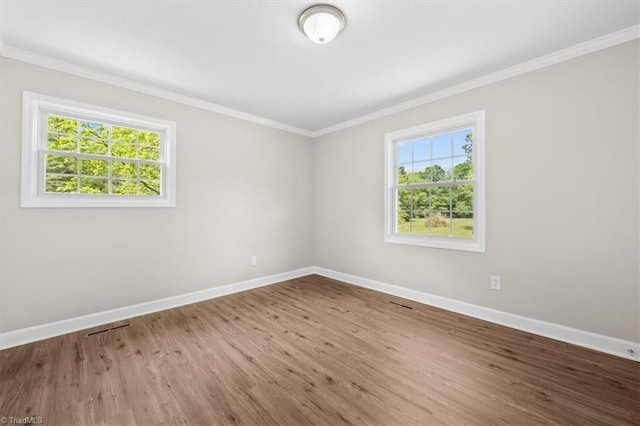 2517 Hopewell Friends Rd, Asheboro, NC 27205 - empty room featuring wood finished floors and ornamental molding