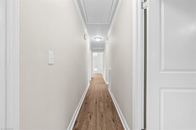 2517 Hopewell Friends Rd, Asheboro, NC 27205 - hall featuring attic access, wood finished floors, and crown molding