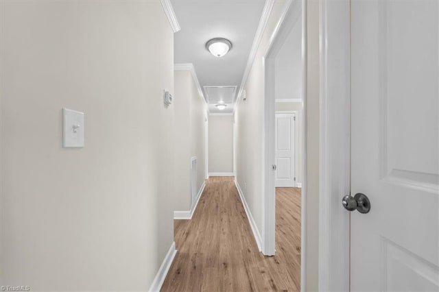 2517 Hopewell Friends Rd, Asheboro, NC 27205 - corridor featuring light wood-style flooring, ornamental molding, and attic access