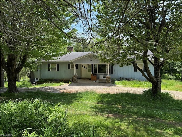 1690 Tom Jackson Rd, Boone, NC 28607 - back of house featuring a chimney