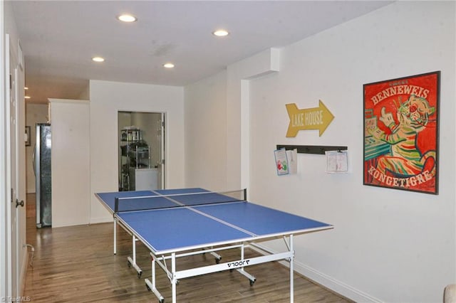 recreation room with recessed lighting, baseboards, and wood finished floors
