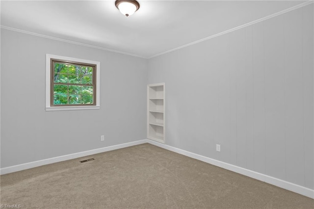 2665 Kecoughtan Rd, Pfafftown, NC 27040 - spare room with carpet, crown molding, and baseboards