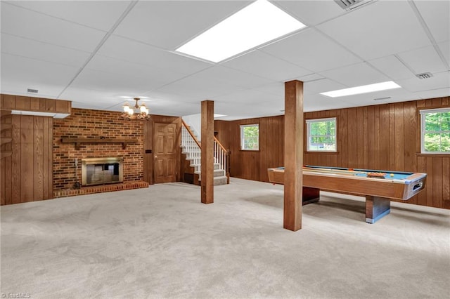 2665 Kecoughtan Rd, Pfafftown, NC 27040 - playroom with wooden walls, carpet flooring, healthy amount of natural light, billiards table, and a fireplace