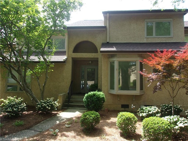 1935-C Eastchester Dr, High Point, NC 27265 - view of front of house with stucco siding and crawl space