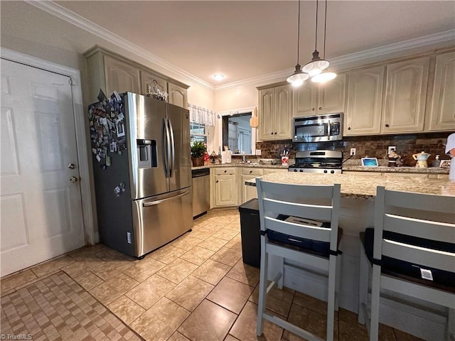 kitchen featuring light stone counters, pendant lighting, tasteful backsplash, crown molding, and appliances with stainless steel finishes