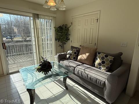 living room with light tile patterned flooring