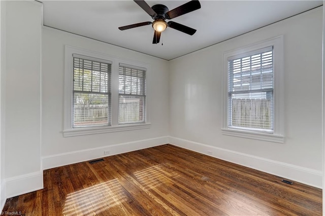 unfurnished room with hardwood / wood-style flooring and ceiling fan