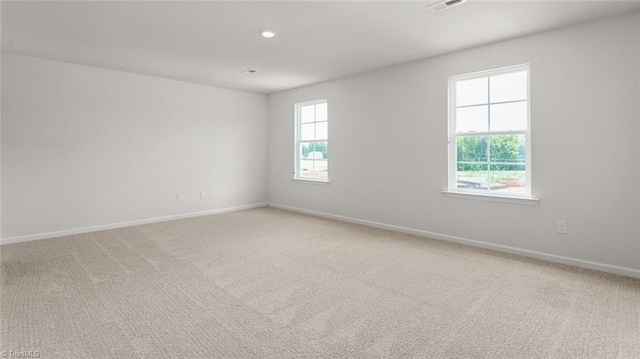 1529 String Dr, Winston-Salem, NC 27107 - unfurnished room featuring light carpet, baseboards, and recessed lighting