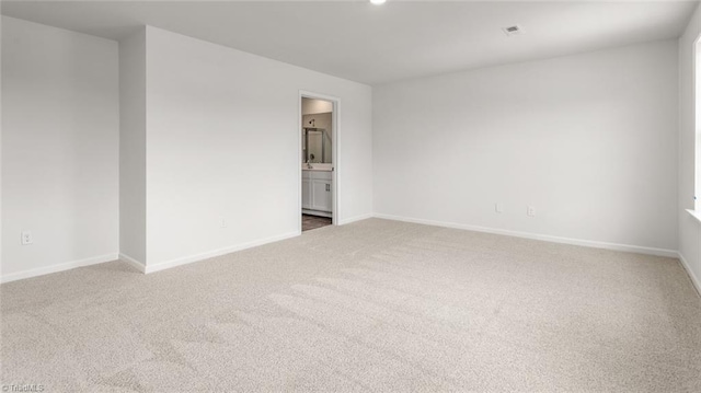 1529 String Dr, Winston-Salem, NC 27107 - carpeted spare room featuring baseboards