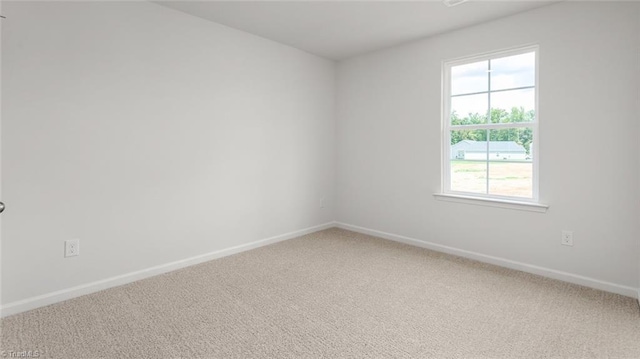 1529 String Dr, Winston-Salem, NC 27107 - spare room with light colored carpet and baseboards