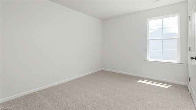 1529 String Dr, Winston-Salem, NC 27107 - spare room with carpet flooring and baseboards