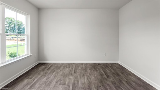 1529 String Dr, Winston-Salem, NC 27107 - spare room featuring dark wood-style flooring and baseboards