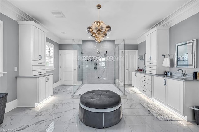 bathroom featuring marble finish floor, a stall shower, vanity, and ornamental molding