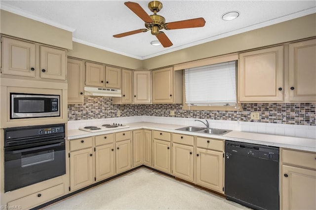 kitchen featuring crown molding, sink, backsplash, and black appliances