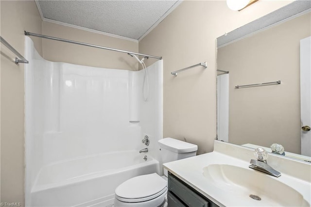 full bathroom with vanity, toilet, bathing tub / shower combination, and a textured ceiling