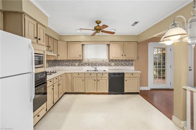 kitchen featuring sink, ceiling fan, ornamental molding, black appliances, and decorative backsplash