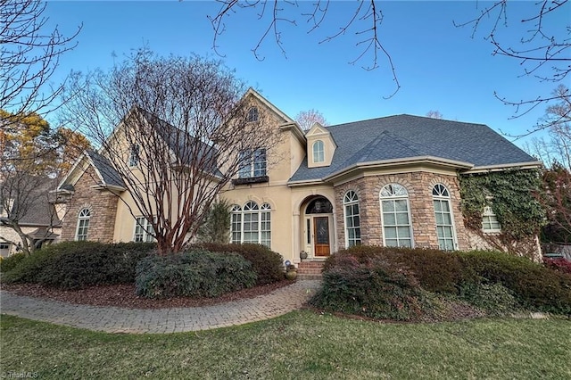 view of front of property with a front lawn