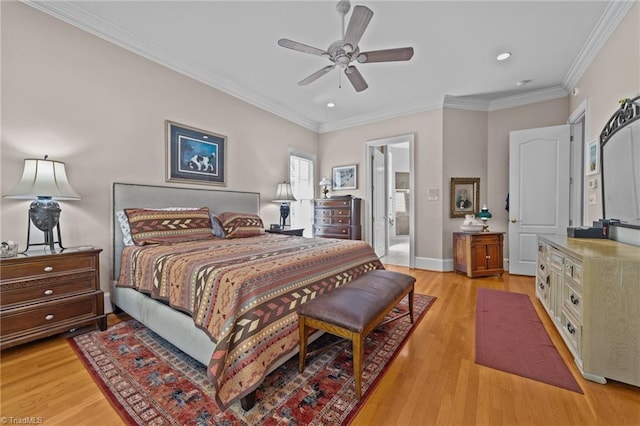 bedroom featuring crown molding, connected bathroom, ceiling fan, and light hardwood / wood-style floors