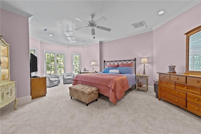 carpeted bedroom with crown molding and ceiling fan