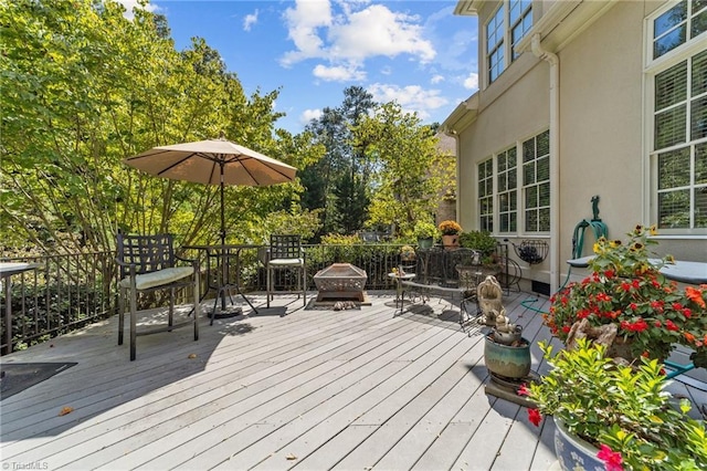 deck with a fire pit