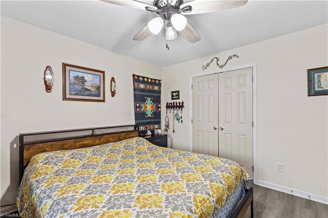 1595 Cheatham Ford Rd, Hiddenite, NC 28636 - bedroom featuring a closet, baseboards, ceiling fan, a textured ceiling, and wood finished floors