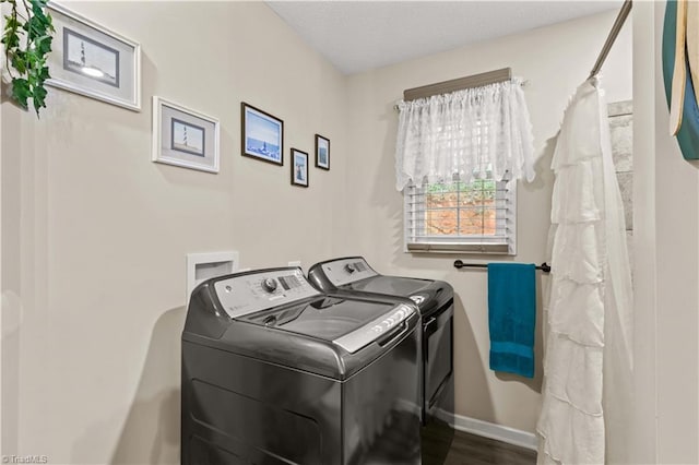 1595 Cheatham Ford Rd, Hiddenite, NC 28636 - laundry room featuring baseboards, laundry area, washing machine and clothes dryer, and wood finished floors