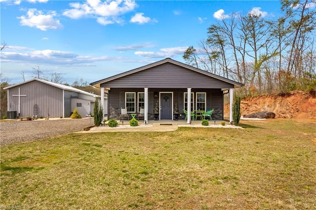 1595 Cheatham Ford Rd, Hiddenite, NC 28636 - view of front of property with cooling unit, covered porch, driveway, and a front lawn