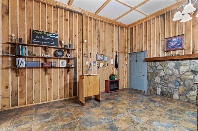1595 Cheatham Ford Rd, Hiddenite, NC 28636 - miscellaneous room featuring wood walls and stone finish floor