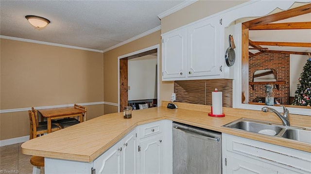 kitchen featuring white cabinetry, dishwasher, sink, kitchen peninsula, and crown molding