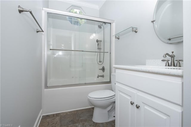 full bathroom featuring vanity, toilet, and combined bath / shower with glass door