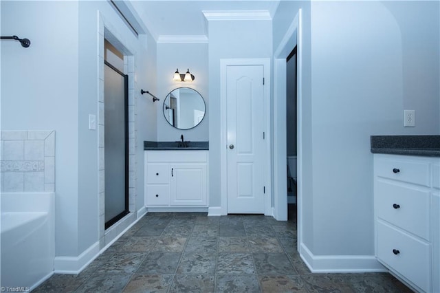 bathroom featuring crown molding, plus walk in shower, and vanity